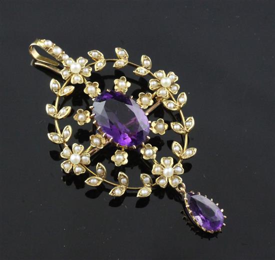 A Victorian 15ct gold, amethyst seed pearl drop pendant brooch, 2.25in.